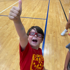 summer camp 2022 - camper  gives thumbs up